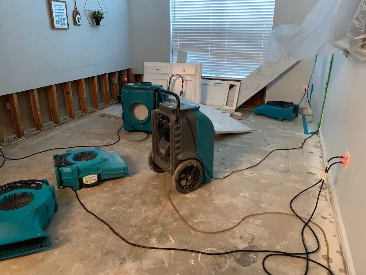 Dehumidifier in flood-cut room for Water Damage Restoration in Joliet